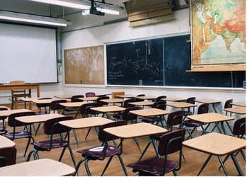 Desks in an empty classroom.