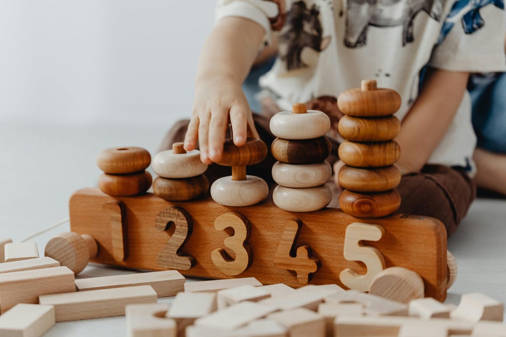 Daycare student playing with rote counting blocks