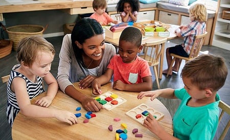teacher and students at child care centerf