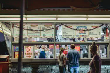 Photo of a high school concession stand, including menu prices