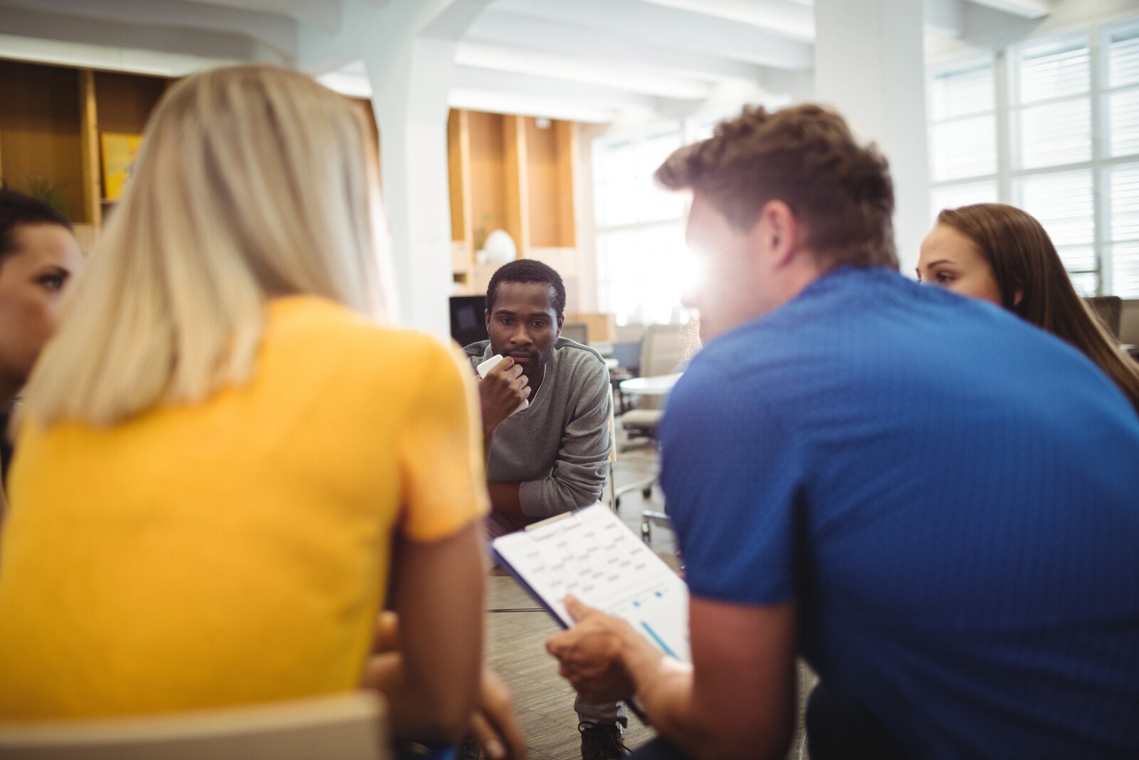 School leaders gathered, discussing what fundraising software to use