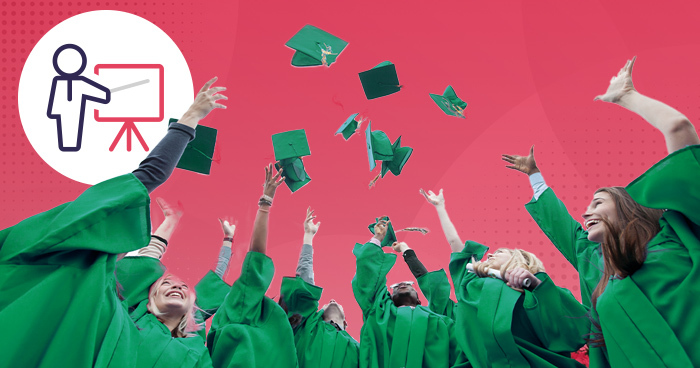 Graduates in green gowns happily tossing caps in the air, symbolizing successful event completion.