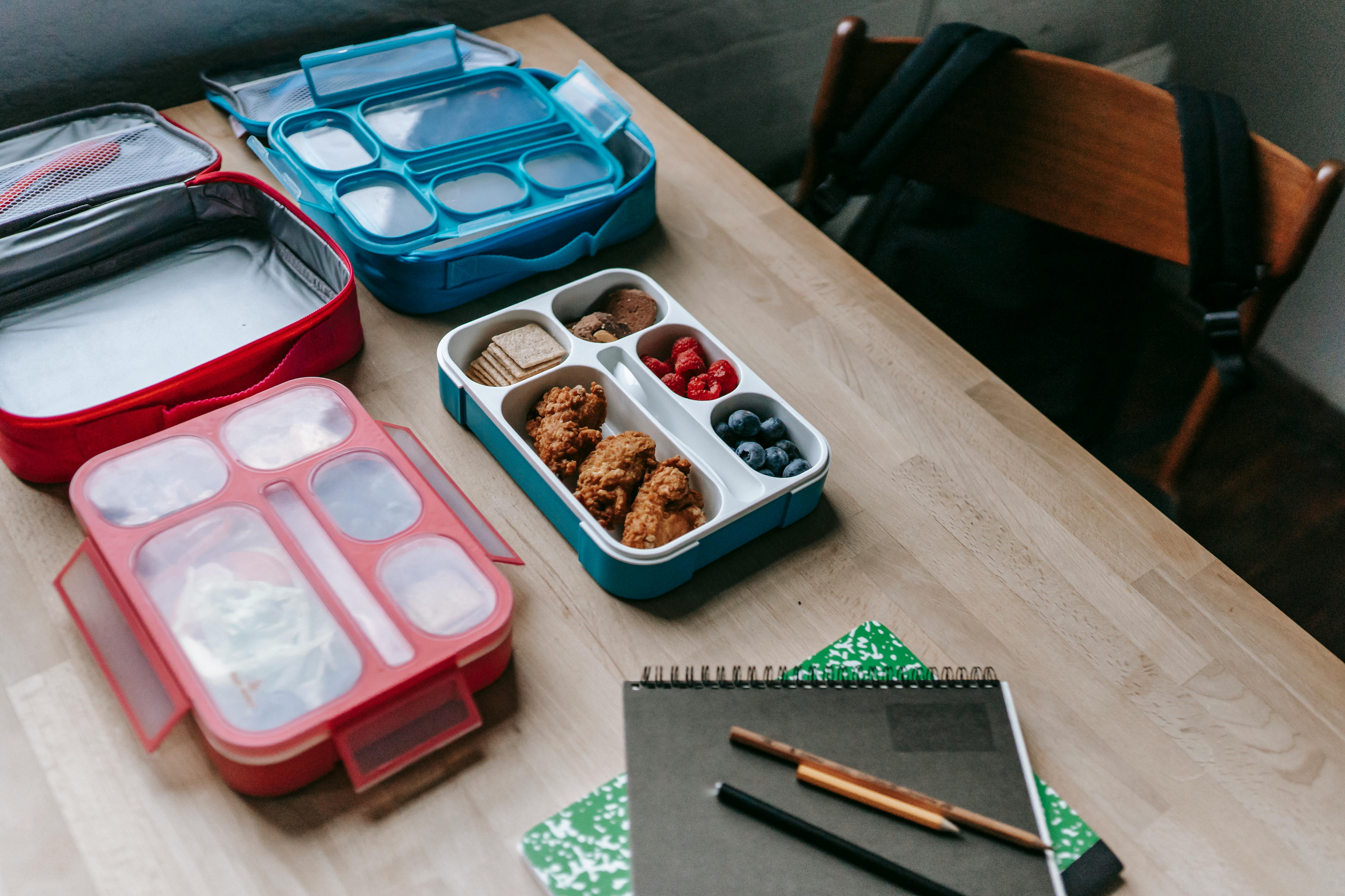 Photo of lunch boxes and food, representing school lunch menu ideas