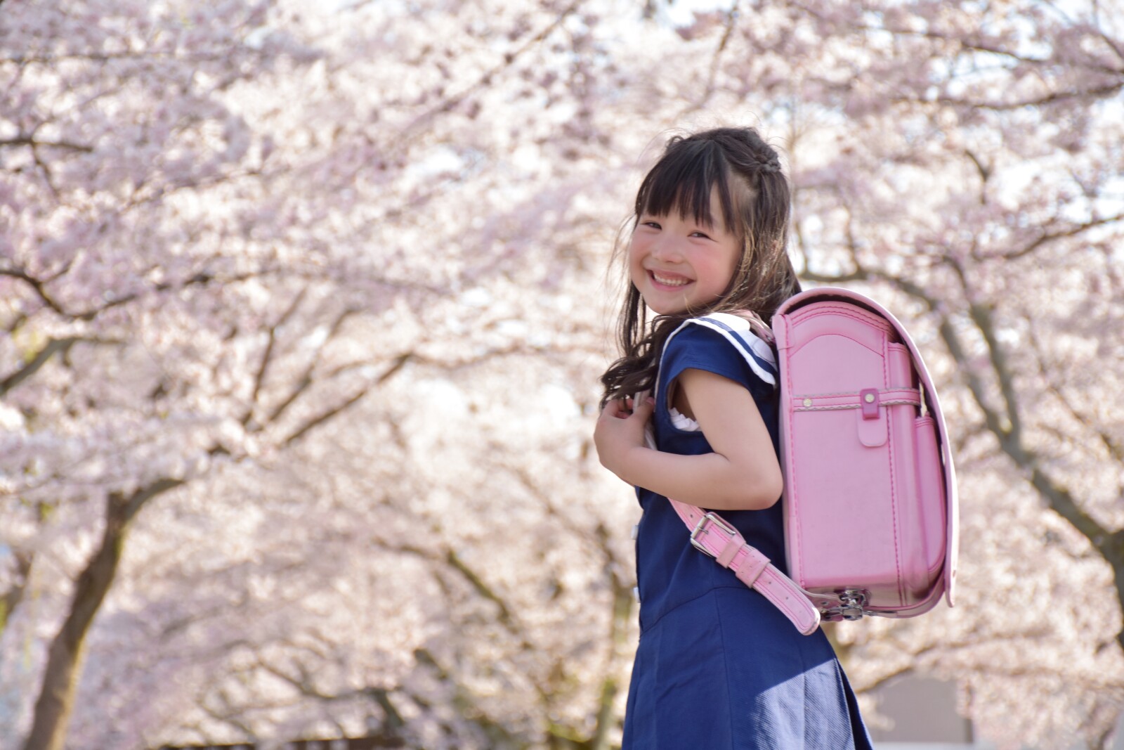 Preschooler playing outside during spring