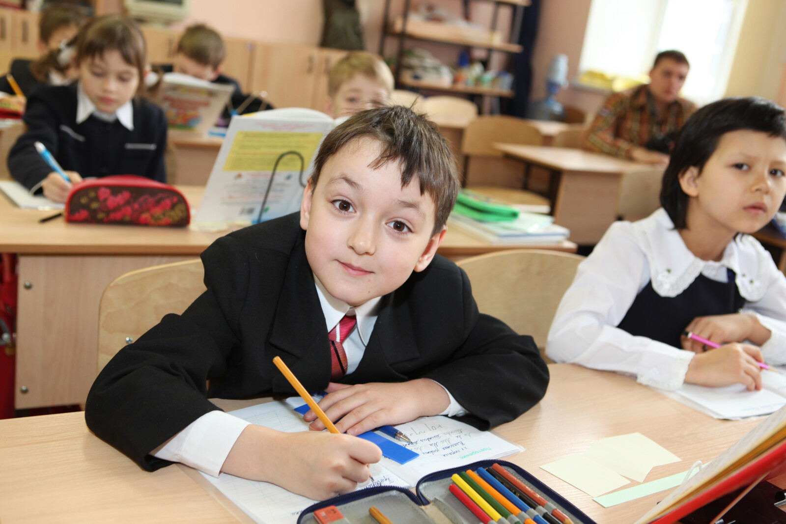 Preschoolers at Desks in a Classroom